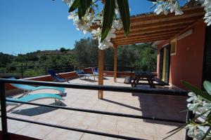 a view of a patio with a wooden roof at Tenuta Fangati in Portoferraio