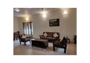 Fotografie z fotogalerie ubytování Stays 42 - Oleander Suites Coorg v destinaci Madikeri