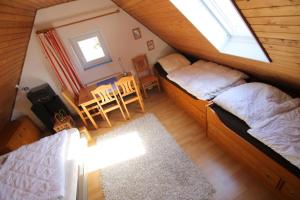 Ένα ή περισσότερα κρεβάτια σε δωμάτιο στο 1015 - Haus Tuskulum