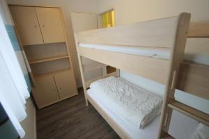 Postel nebo postele na pokoji v ubytování 1009 - Seesternweg 4 - EG