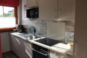 Kuchyň nebo kuchyňský kout v ubytování 1403 - Haus Rönneburg
