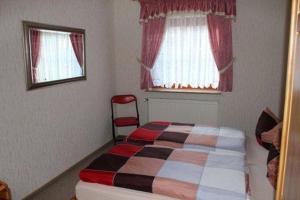 Postel nebo postele na pokoji v ubytování 1403 - Haus Rönneburg