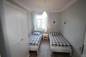 Postel nebo postele na pokoji v ubytování 1023- Alte Da h me - Neu