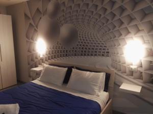 Postel nebo postele na pokoji v ubytování B&B via Piave da Lillo
