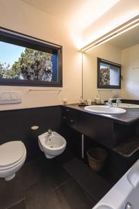Kupatilo u objektu Murphy Holiday Home - Villa La Sbandata