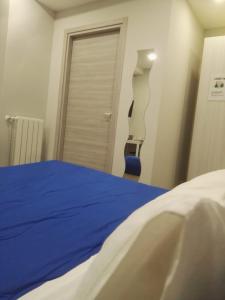 Postel nebo postele na pokoji v ubytování B&B via Piave da Lillo