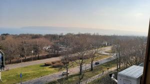 a view of a street and a road with trees at Apartment Icovi 2 in Varna City