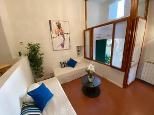 Postel nebo postele na pokoji v ubytování La Verde di Vernazza - Art Studio - AC&WiFi - Vernazzarentals