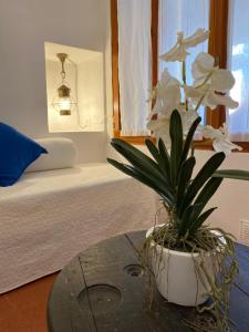 Postel nebo postele na pokoji v ubytování La Verde di Vernazza - Art Studio - AC&WiFi - Vernazzarentals