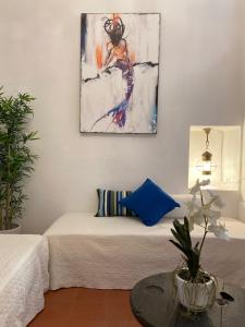 Postel nebo postele na pokoji v ubytování La Verde di Vernazza - Art Studio - AC&WiFi - Vernazzarentals