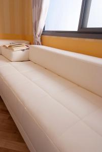 A bed or beds in a room at Casa Mobile - Cisano San Vito ****