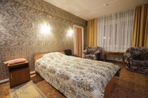 Кровать или кровати в номере Hotel Aeroport Krasnoyarsk