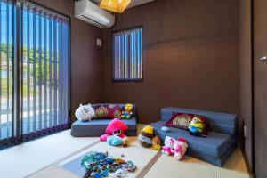 Foto de la galería de Vacation Rental Motobu Grande BBQ機材完備の新築ヴィラ！！ en Motobu