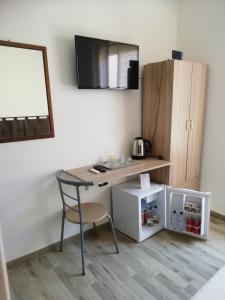 A kitchen or kitchenette at B&B Casa Delfina