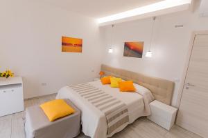A bed or beds in a room at Pineta del Mare