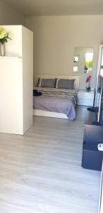 a bedroom with a bed in a room at Studio Anastasia in Limassol