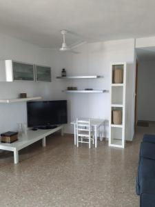 TV a/nebo společenská místnost v ubytování Apartamento Con Preciosas Vistas Al Mar y WIFI