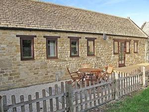 The building where the cottage is located 