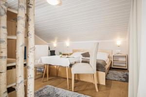 Posezení v ubytování Gästehaus die geislerin