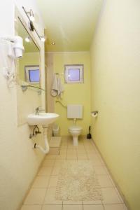 A bathroom at Apartmani Horvat