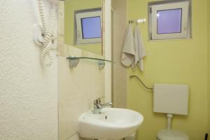 Koupelna v ubytování Apartmani Horvat