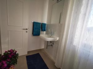 Kúpeľňa v ubytovaní Palau Maisonettes