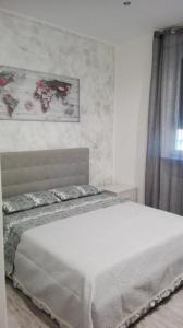 Postel nebo postele na pokoji v ubytování Casa vacanze Tre stelle