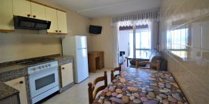 Kuchyň nebo kuchyňský kout v ubytování Apartamentos de playa en un entorno rural + 45 fotografií