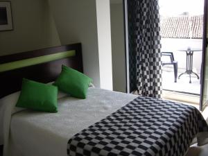 A bed or beds in a room at La Traina