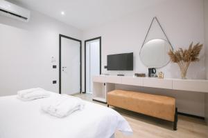Postel nebo postele na pokoji v ubytování Boulevard Boutique Aparthotel