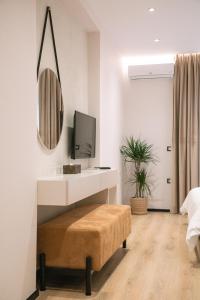 TV a/nebo společenská místnost v ubytování Boulevard Boutique Aparthotel