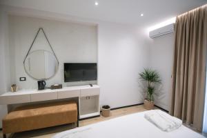 Postel nebo postele na pokoji v ubytování Boulevard Boutique Aparthotel