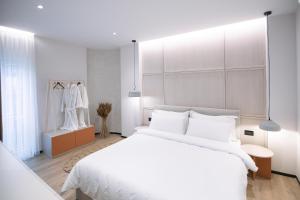 Postel nebo postele na pokoji v ubytování Boulevard Boutique Aparthotel