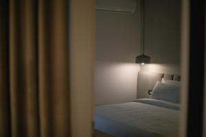 Postel nebo postele na pokoji v ubytování Boulevard Boutique Aparthotel