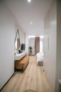 Postel nebo postele na pokoji v ubytování Boulevard Boutique Aparthotel