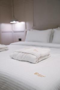 Postel nebo postele na pokoji v ubytování Boulevard Boutique Aparthotel