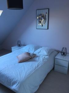 Katil atau katil-katil dalam bilik di Gîte Le Chantecaille