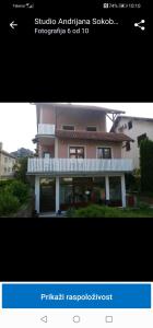 a picture of a building with the words spanish real estate at Apartman Andrijana 1 in Soko Banja