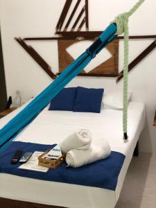 Postel nebo postele na pokoji v ubytování Casa Universo Holbox