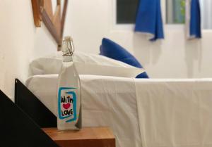 Postel nebo postele na pokoji v ubytování Casa Universo Holbox