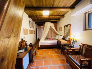 Postel nebo postele na pokoji v ubytování Grace Homestay