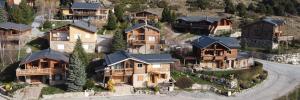 an aerial view of a large group of houses at Appartements dans Chalet in Font-Romeu