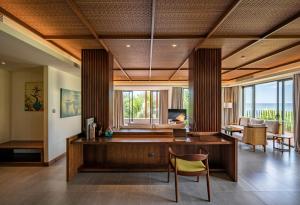 Ein Sitzbereich in der Unterkunft Dusit Princess Moonrise Beach Resort