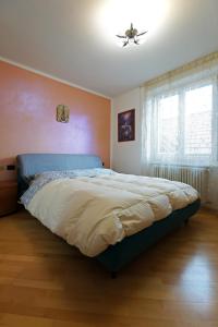 מיטה או מיטות בחדר ב-Cuore nel Muller