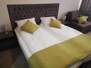 Postel nebo postele na pokoji v ubytování Hotel Ponti