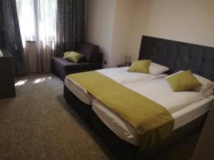 Postel nebo postele na pokoji v ubytování Hotel Ponti
