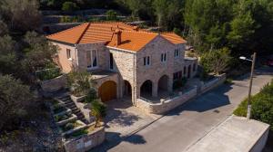 an overhead view of a house with an orange roof at Villa Kety in Prigradica