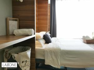 Katil atau katil-katil dalam bilik di Aeropod Sovo Studio - Laxzone Suite