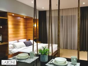 Katil atau katil-katil dalam bilik di Aeropod Sovo Studio - Laxzone Suite