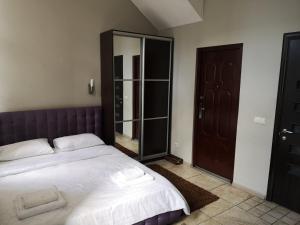 Postel nebo postele na pokoji v ubytování Opera Apart Hotel